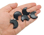 Obsidian Moon gemstone pendant featuring a crescent moon design, crafted by GemstoneGO, showcasing a polished black stone pendant.