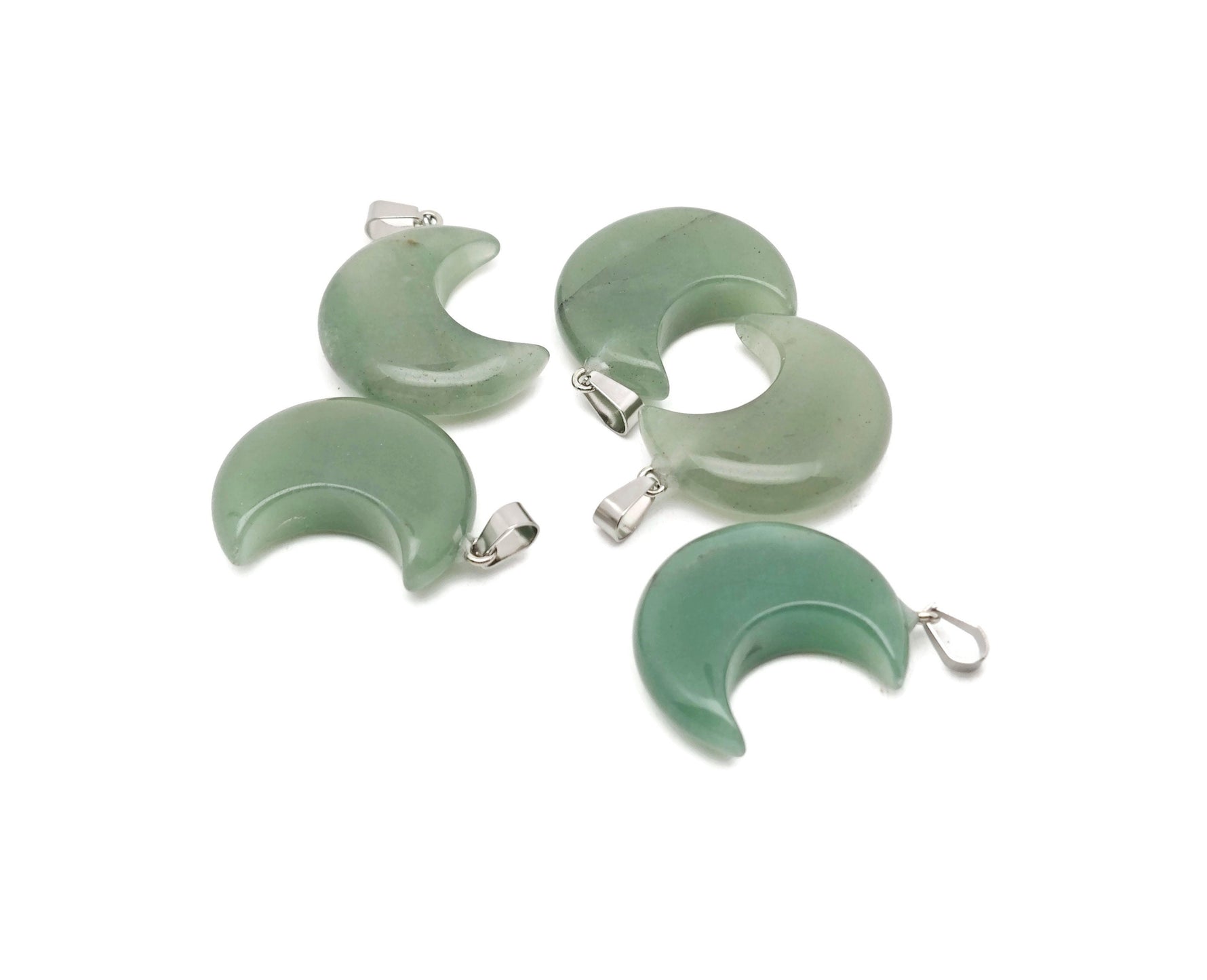 Aventurine moon gemstone pendant featuring a crescent moon design from GemstoneGO, with green aventurine gemstone and silver setting.
