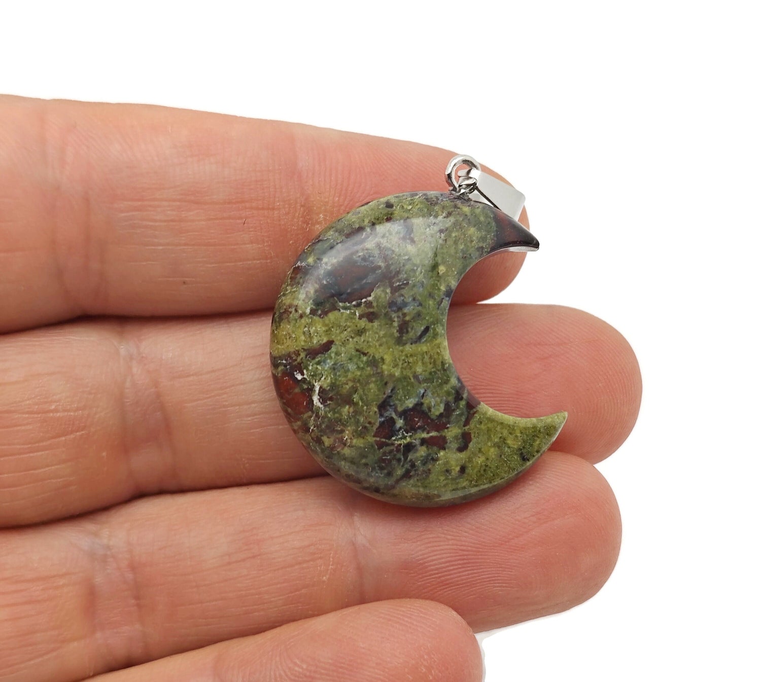 Dragon Blood Jasper moon pendant featuring a crescent moon design from GemstoneGO, showcasing rich red and brown gemstone details.