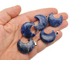 Sodalite moon gemstone pendant with a crescent moon design, crafted by GemstoneGO, featuring deep blue and white mineral patterns.