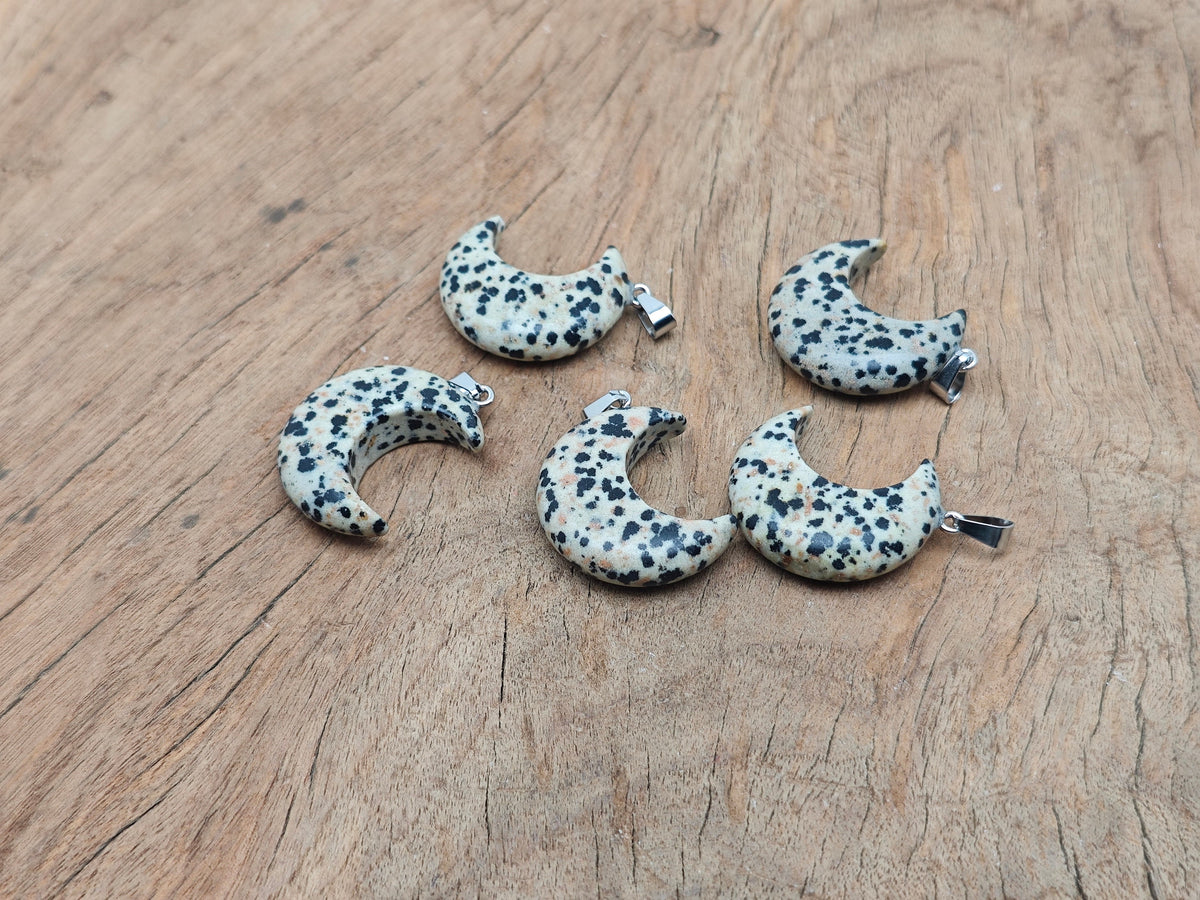 Dalmatian Jasper moon pendant with crescent moon shape, featuring black spots on a smooth gemstone, by GemstoneGO.