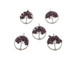 Garnet Tree of Life gemstone pendant from GemstoneGO featuring a detailed gemstone crystal design on a silver setting.