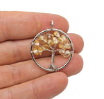 Citrine Tree of Life gemstone pendant from GemstoneGO featuring a detailed gold-tone tree design and vibrant citrine crystal accents.