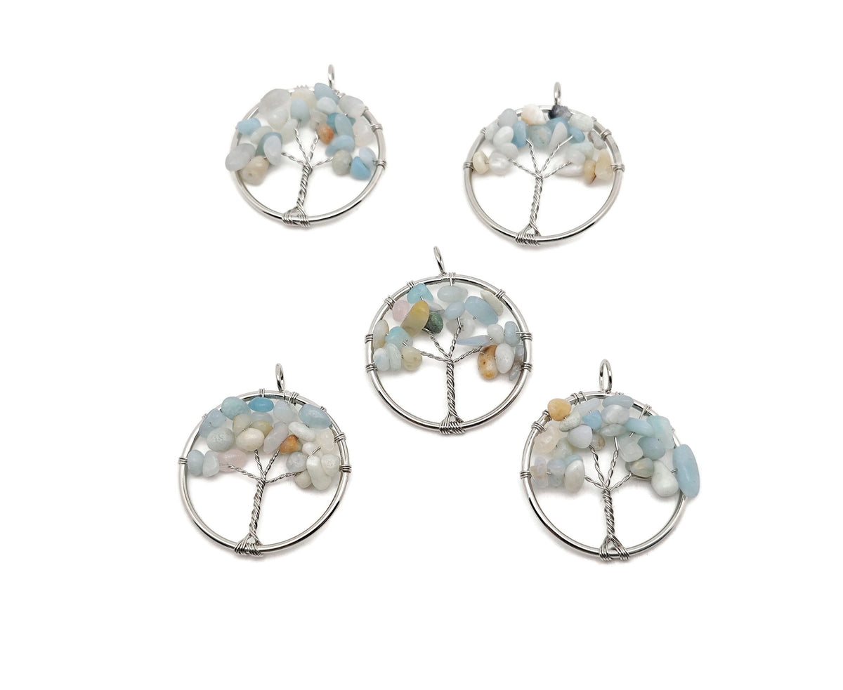 Caribbean Calcite Tree of Life gemstone pendant from GemstoneGO, featuring colorful calcite crystals arranged in a detailed tree design.