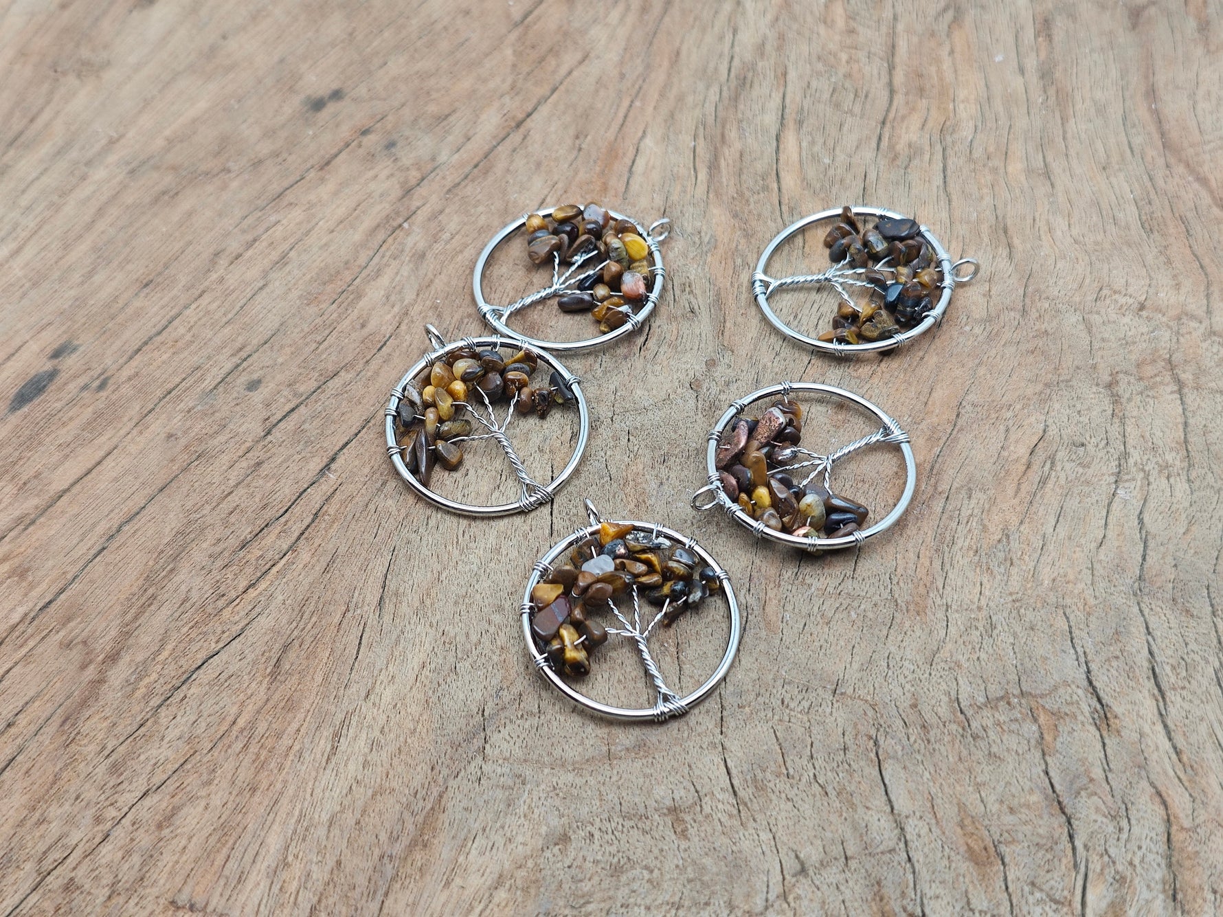 Tiger Eye Tree of Life gemstone pendant by GemstoneGO, featuring a detailed pendant with tiger eye stones on a silver chain.