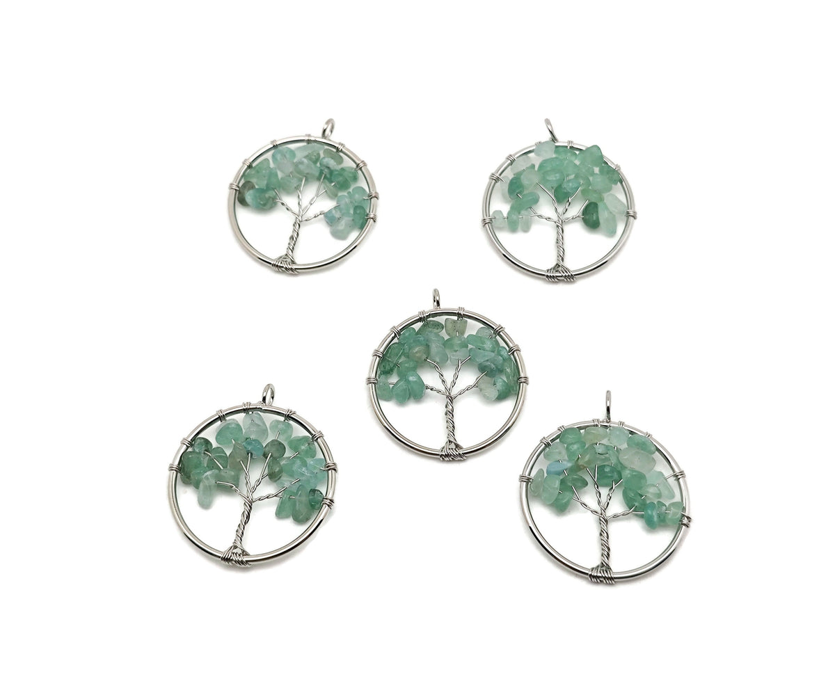 A gemstone Aventurine Tree of Life pendant with intricate wirework, showcasing green aventurine gemstones on a delicate chain.