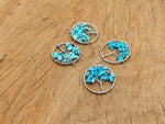 Turquoise Tree of Life gemstone pendant from GemstoneGO featuring a detailed tree design and vibrant blue turquoise stone.