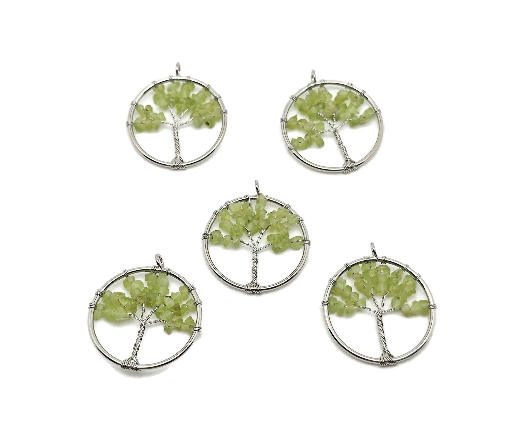 Peridot Olive Tree of Life gemstone pendant from GemstoneGO featuring a detailed tree design with green peridot stones.
