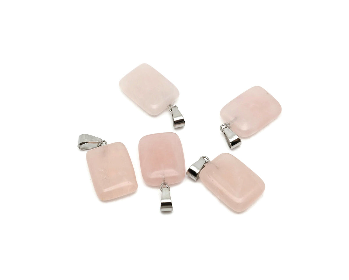 Rose quartz rectangle crystal pendant from GemstoneGO, showcasing a polished pink gemstone with a silver bail for jewelry.