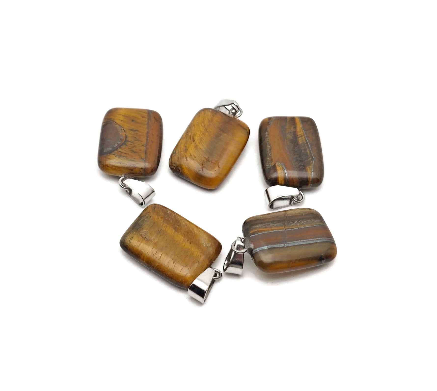 Tiger Eye rectangle-shaped crystal pendant by GemstoneGO, showcasing a polished gemstone with rich golden-brown hues and smooth surface.
