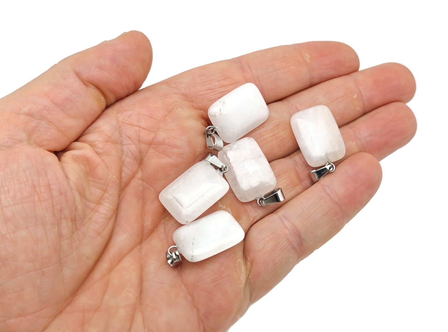 Clear quartz rectangle-shaped crystal pendant from GemstoneGO, showcasing a polished, transparent gemstone for jewelry making.