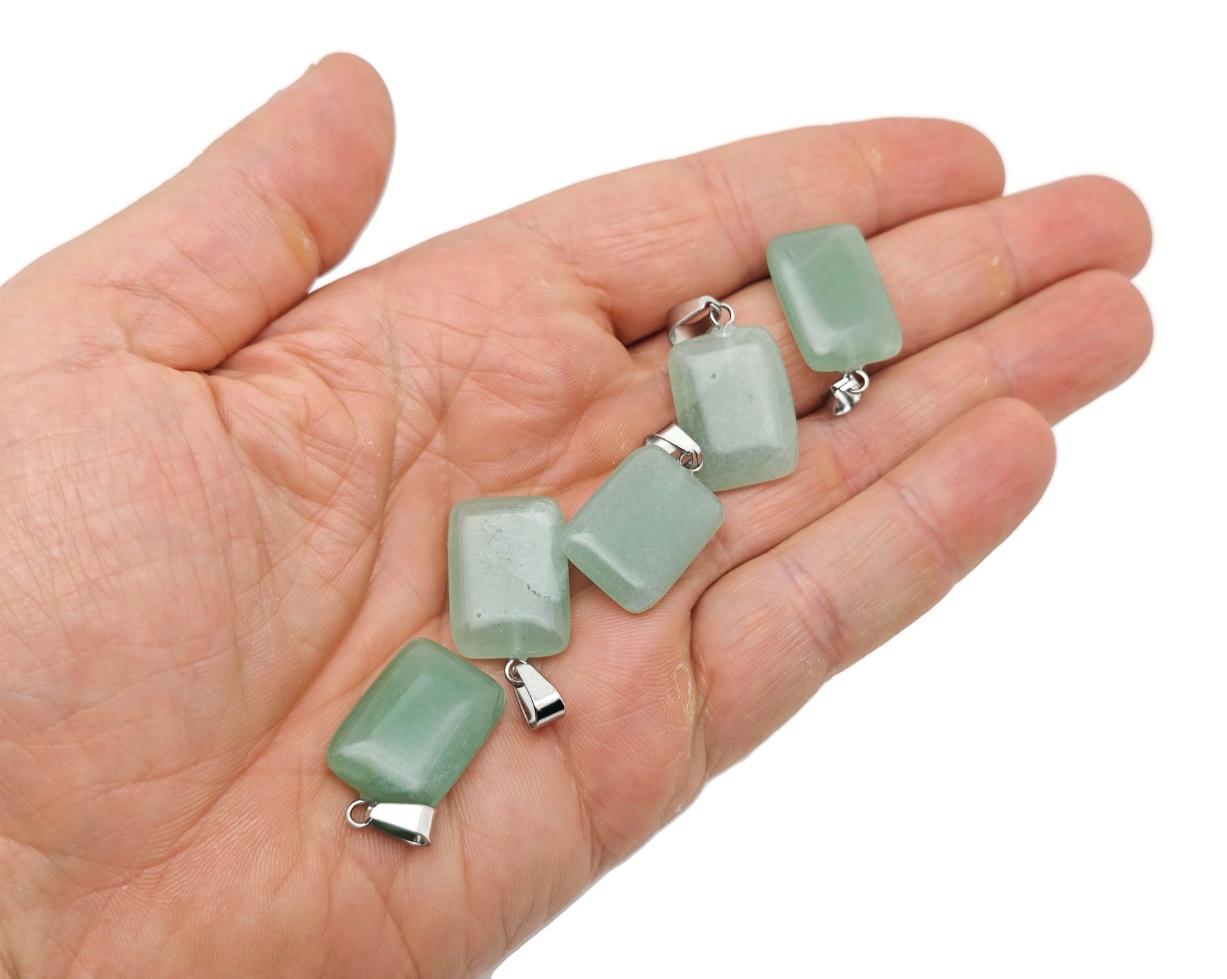 A rectangle-shaped aventurine crystal pendant from GemstoneGO, showcasing a smooth green gemstone with natural gemstone details.