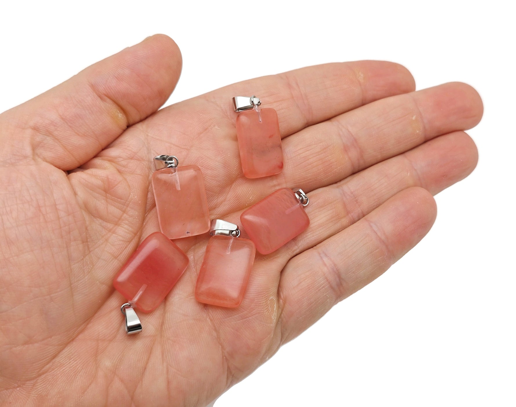 Cherry Quartz rectangle crystal pendant from GemstoneGO, showcasing a vibrant red gemstone with a polished rectangular shape.