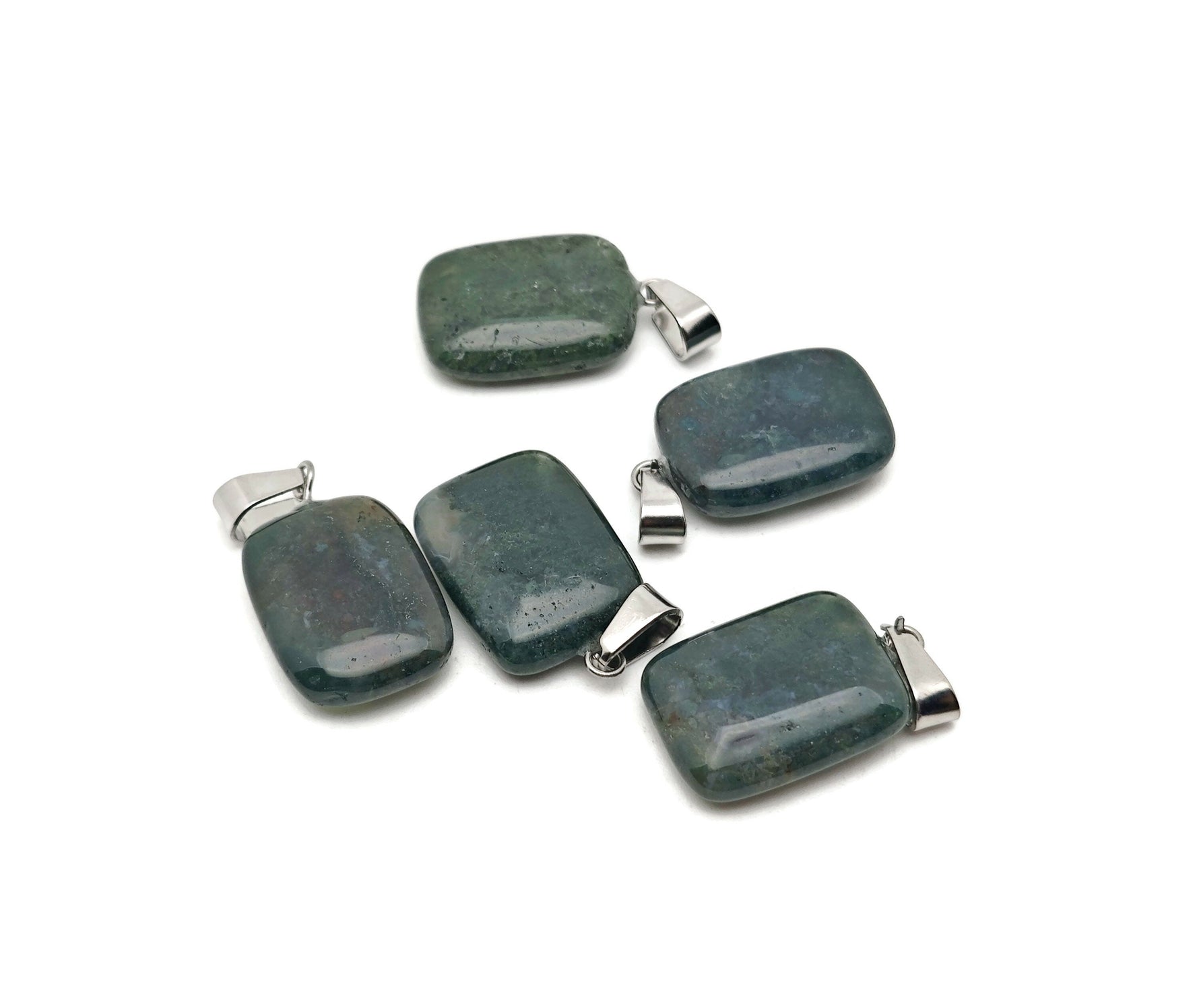 Moss agate crystal pendant in a rectangular shape with natural green and brown patterns, from GemstoneGO.