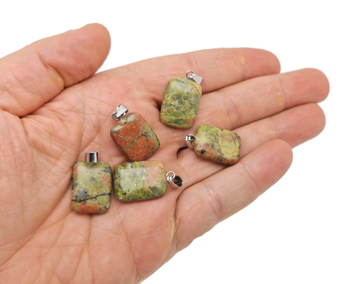 Unakite rectangle-shaped crystal pendant from GemstoneGO, showcasing vibrant orange and green gemstone with polished surface.