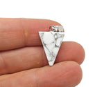 Howlite triangle-shaped crystal pendant by GemstoneGO, showcasing smooth white gemstone with gray veining, ideal for jewelry making.