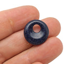 Blue Goldstone crystal donut pendant, 18mm Pi stone from GemstoneGO, featuring a shimmering blue and gold speckled surface.