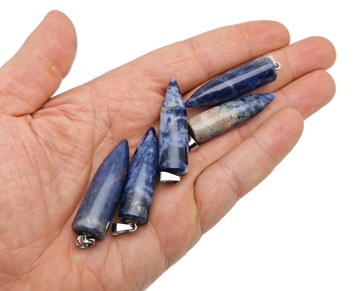 Polished gemstone bullet pendant with carved design, crystal healing mineral in mixed colors, from GemstoneGO.