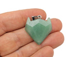 Aventurine gemstone wolf head pendant from GemstoneGO, featuring detailed crystal jewelry design.