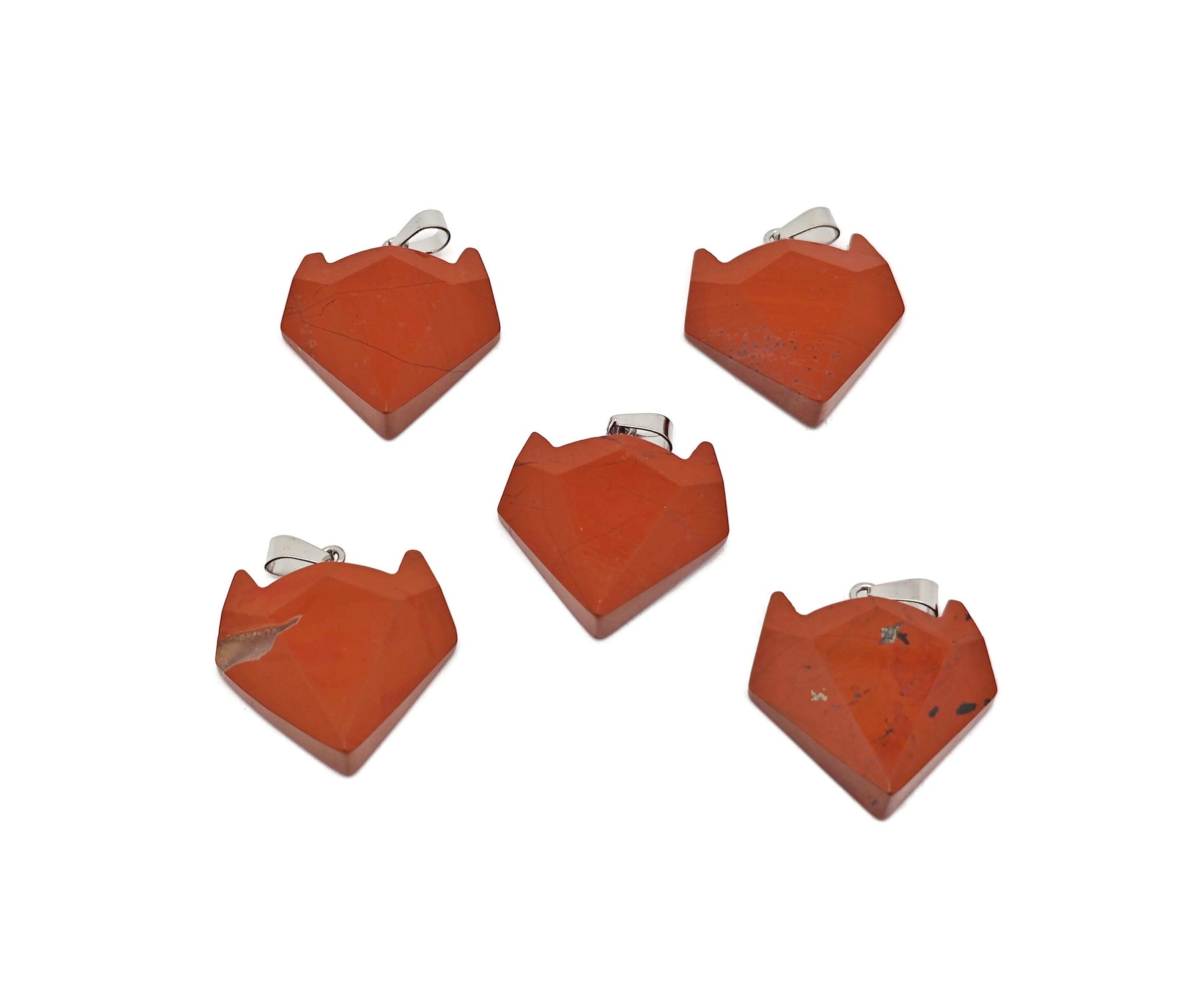 Red Jasper Wolf Head gemstone pendant from GemstoneGO featuring a detailed wolf head carved from red jasper crystal jewelry.