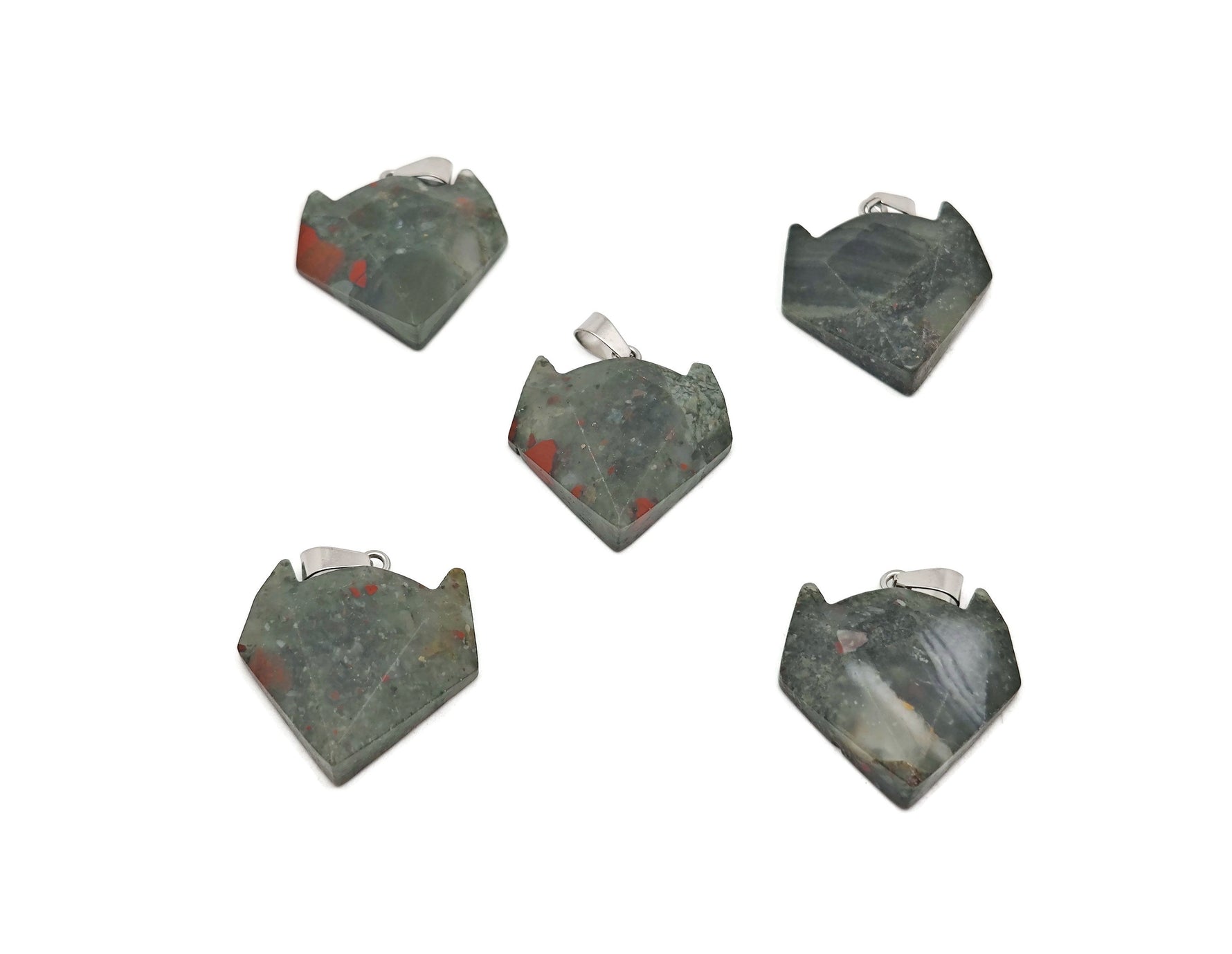 African Bloodstone wolf head gemstone pendant from GemstoneGO, featuring detailed wolf design and vibrant bloodstone crystal.