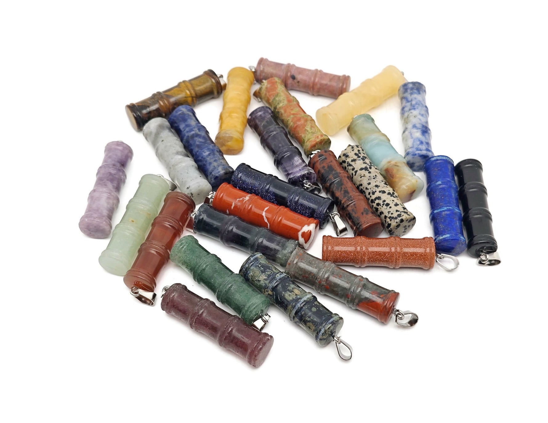 Bamboo-shaped crystal pendant from GemstoneGO featuring a protective clear gemstone, bamboo design, and crystal jewelry style.