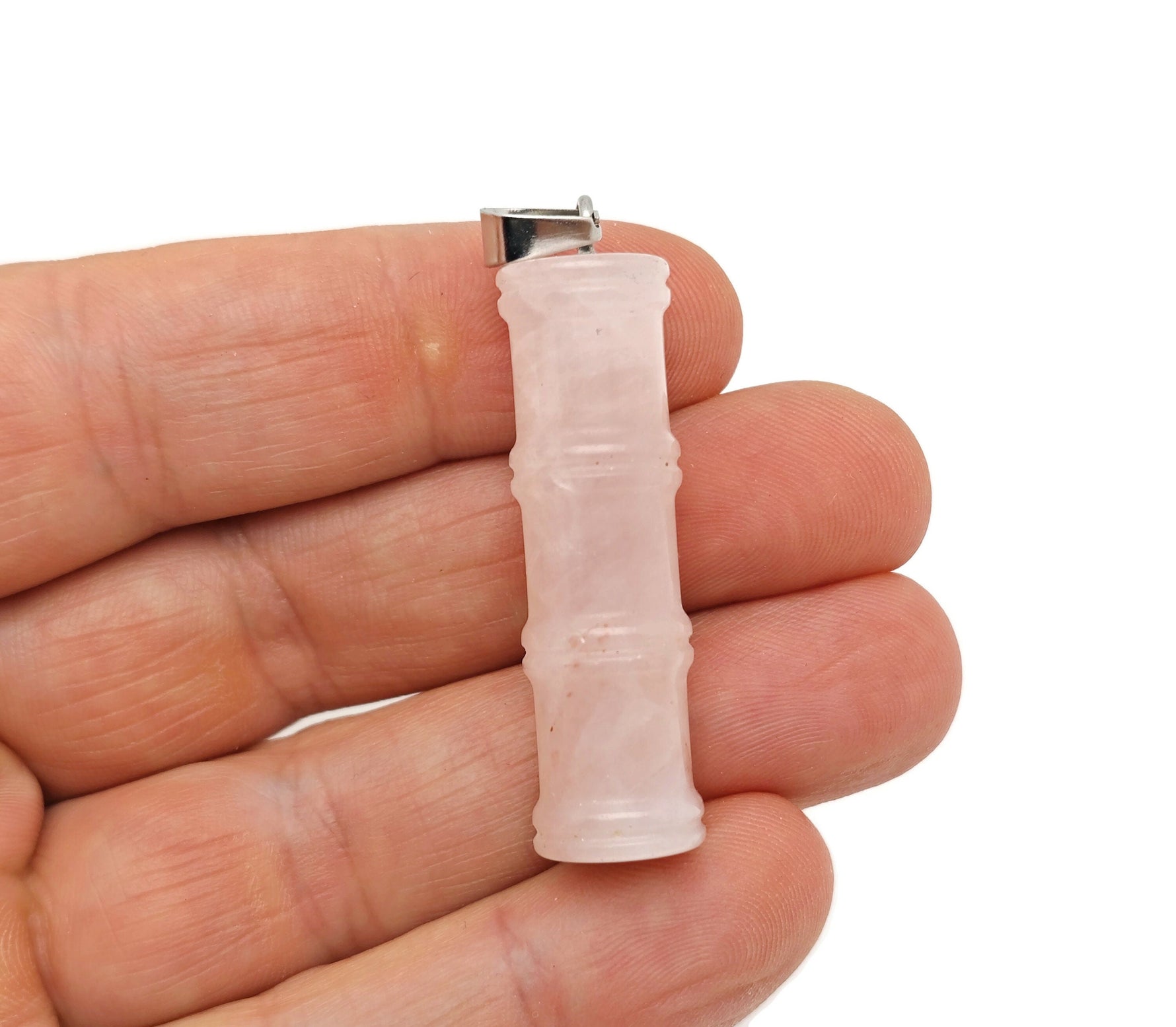 Rose quartz bamboo-shaped crystal pendant from GemstoneGO, featuring a protective clear crystal design on a delicate chain.