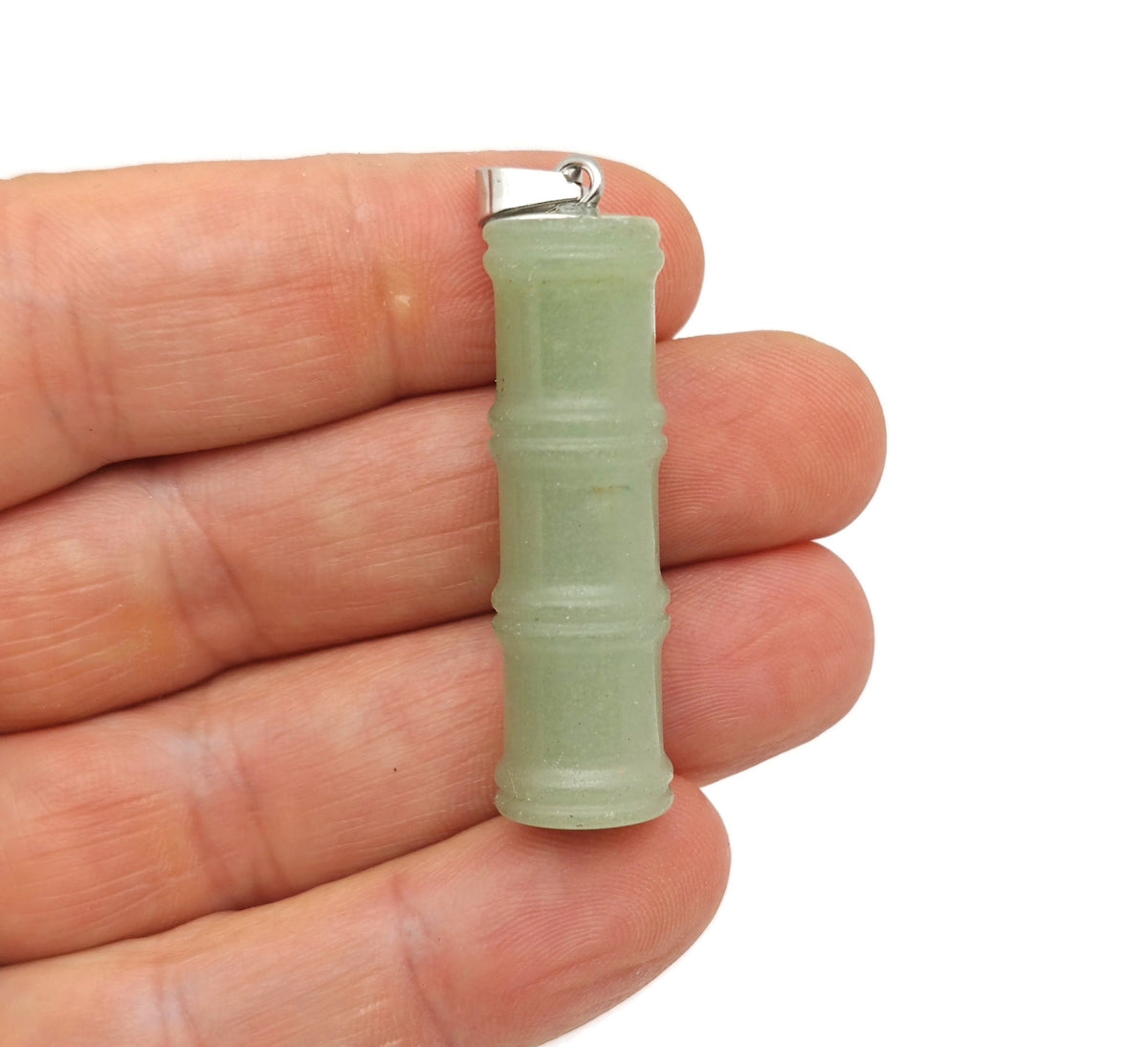 Aventurine bamboo shape crystal pendant featuring a protective crystal design from GemstoneGO, displayed against a neutral background.