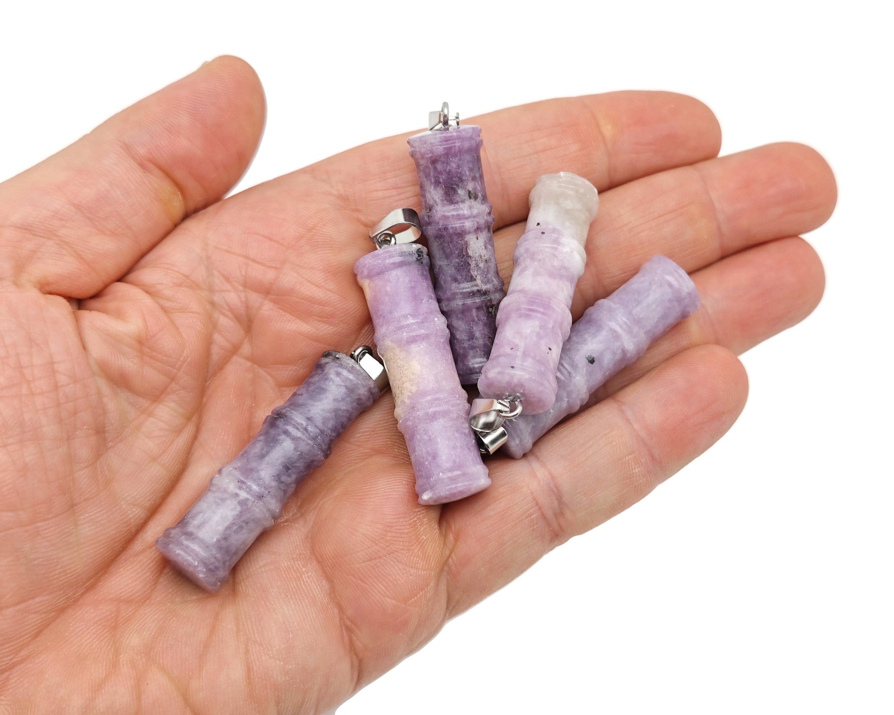 Lepidolite bamboo-shaped crystal pendant from GemstoneGO, featuring protective properties and a natural crystal design.