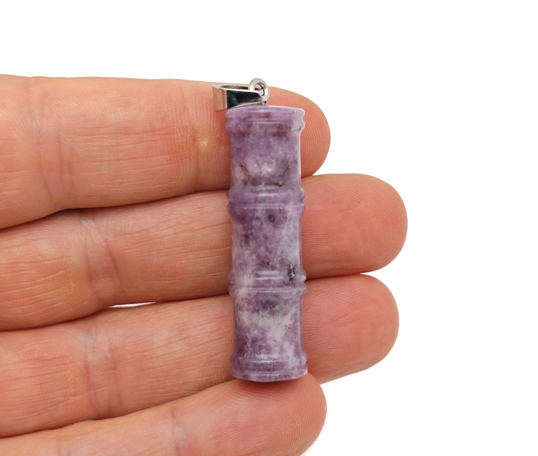 Lepidolite bamboo-shaped crystal pendant from GemstoneGO, featuring a protective healing crystal design.