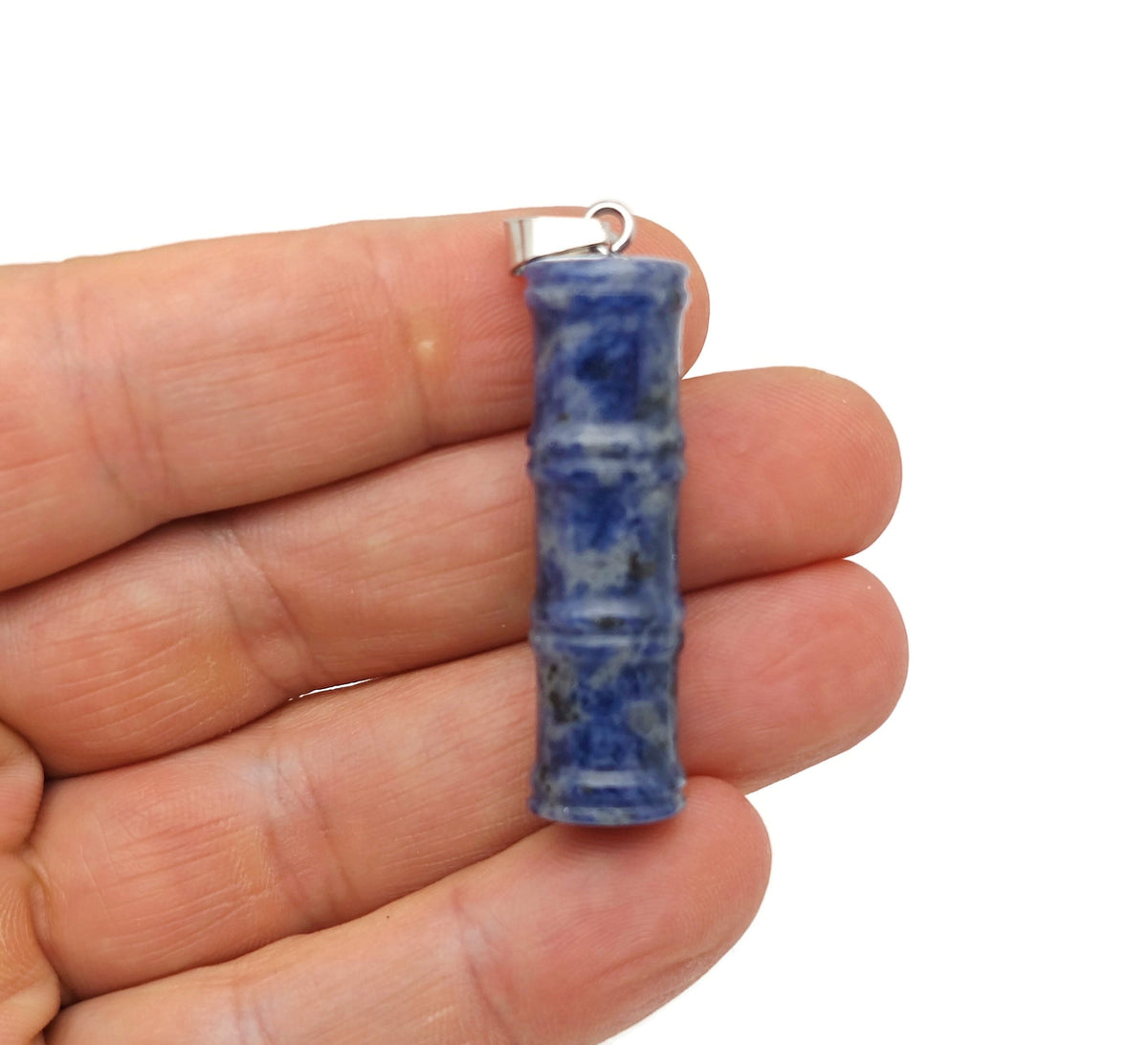 Sodalite bamboo-shaped crystal pendant from GemstoneGO, featuring protective blue gemstone with natural veining and polished finish.