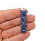 Sodalite bamboo-shaped crystal pendant from GemstoneGO, featuring protective blue gemstone with natural veining and polished finish.