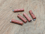Goldstone bamboo-shaped crystal pendant from GemstoneGO, featuring protective crystal design on a silver chain.