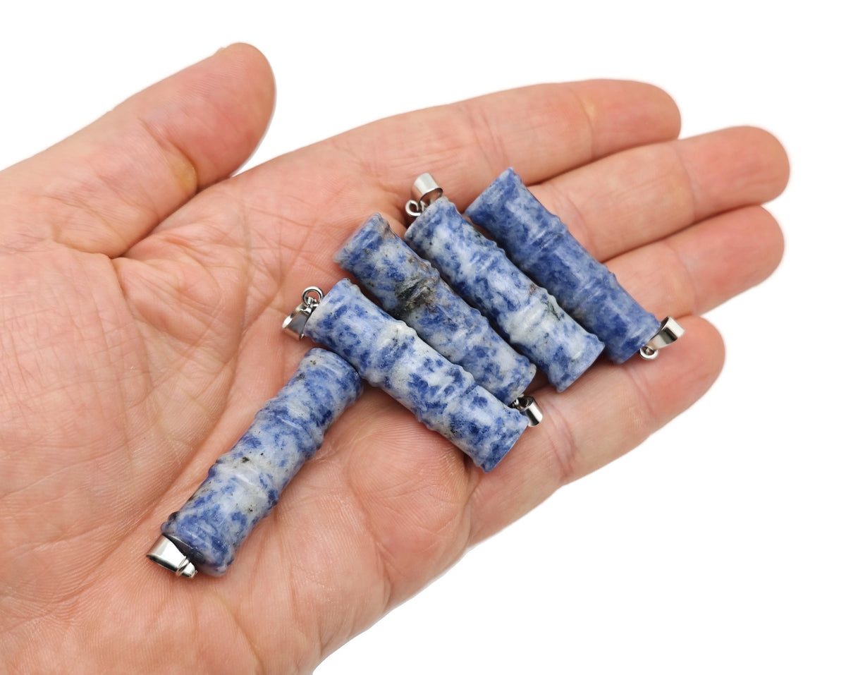 Blue Spot Jasper bamboo-shaped crystal pendant with protective crystal detail, designed by GemstoneGO.