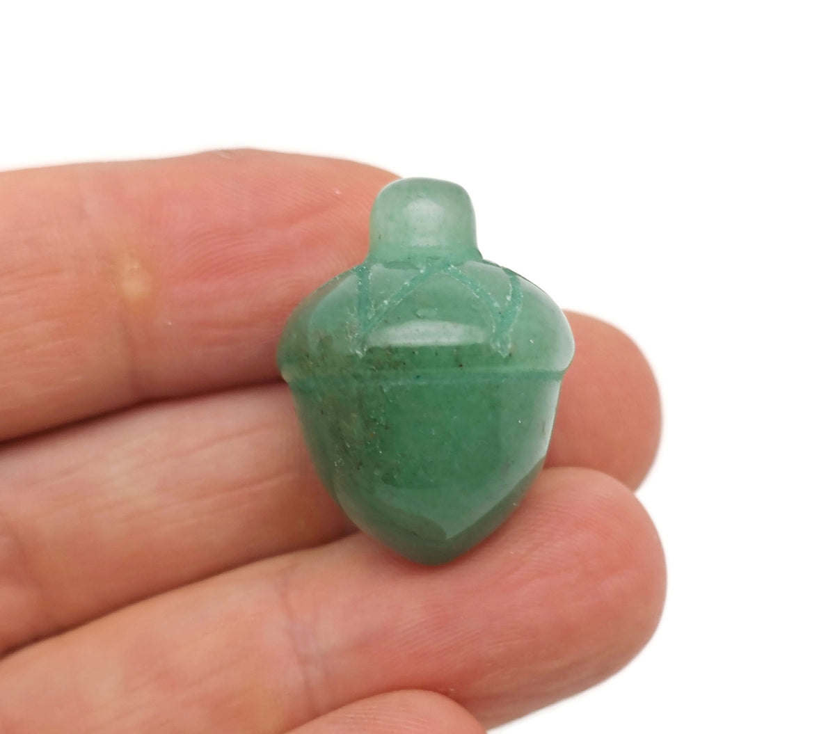 A carved 26mm aventurine crystal acorn gemstone decoration from GemstoneGO, featuring a polished green gemstone with detailed acorn design.