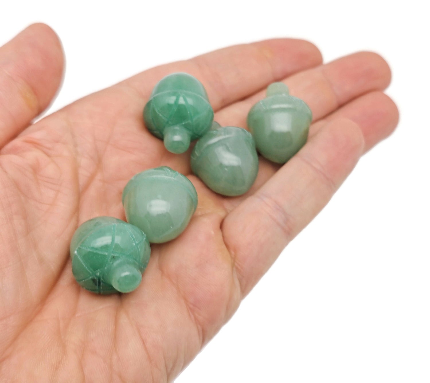 A 26mm carved aventurine crystal acorn gemstone for home decoration, featuring green and brown hues, from GemstoneGO.