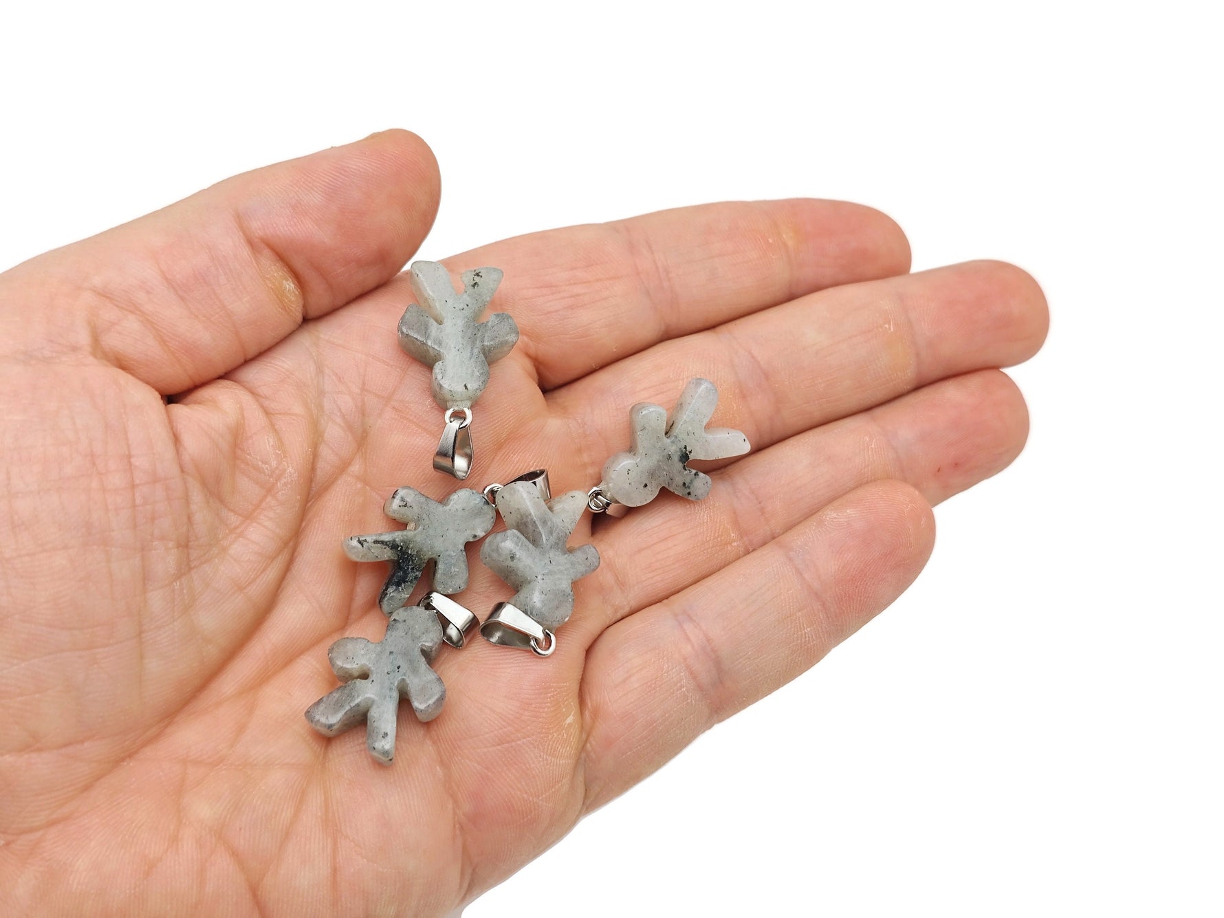 Gingerbread Cookies Men crystal pendant from GemstoneGO, featuring detailed mineral specimen with festive holiday design.