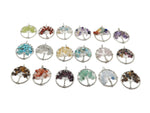 Handmade Tree of Life gemstone pendant from GemstoneGO, featuring colorful crystals and intricate wire details for healing jewelry.