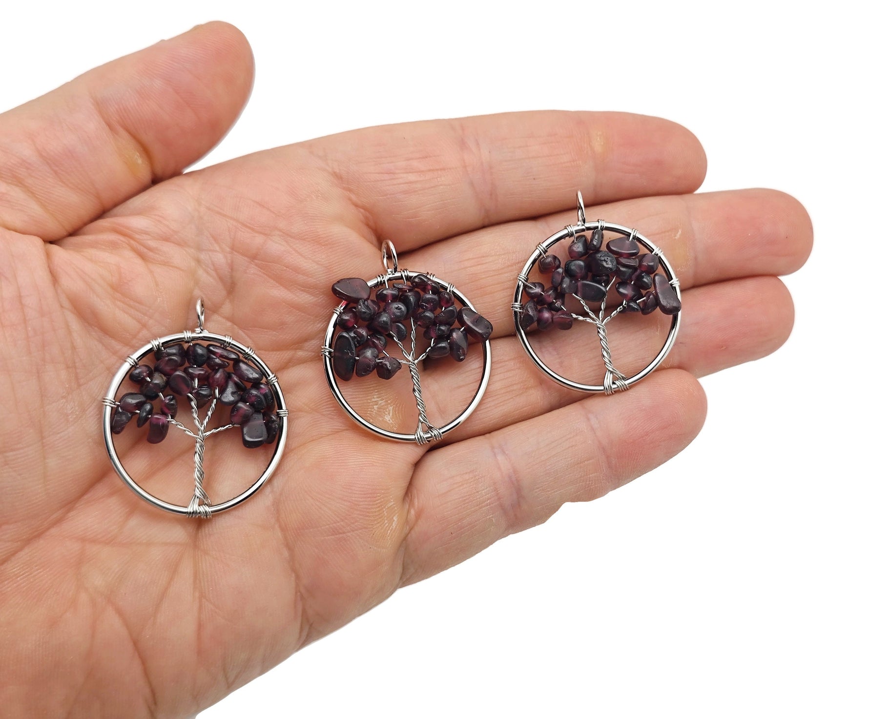 Handmade Tree of Life gemstone pendant with colorful crystals, featuring intricate crystal tree design for healing jewelry.