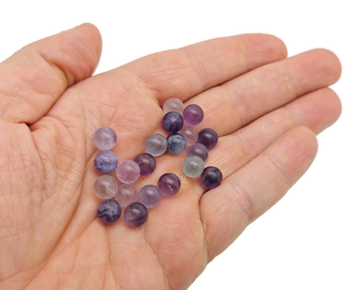 Mini 8mm gemstone sphere crystal ball in assorted colors by GemstoneGO, showcasing vibrant, polished gemstone craftsmanship.