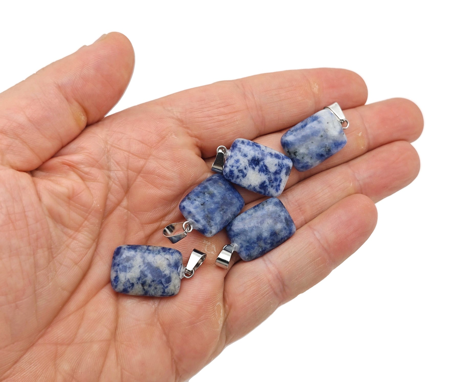 Rectangle shape crystal pendant from GemstoneGO featuring natural mixed gemstones, showcasing a polished, elegant jewelry piece.