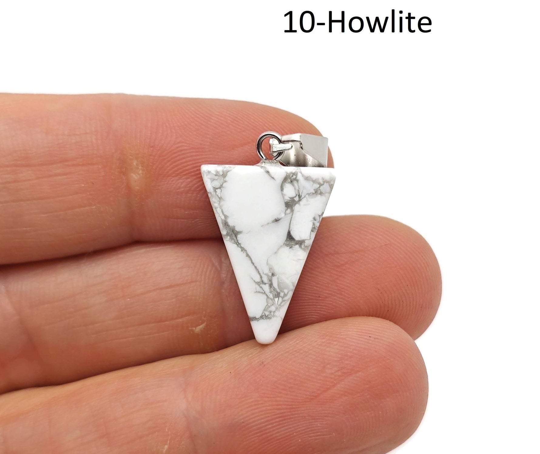 Triangle shape crystal pendant from GemstoneGO, ideal for jewelry making, shown in a mixed bulk wholesale set.