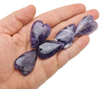 Long heart-shaped love crystal pendant by GemstoneGO featuring a large, sharp gemstone with healing properties.