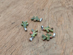 Unakite gingerbread man crystal pendant from GemstoneGO featuring a mineral specimen with detailed earthy orange and green hues.