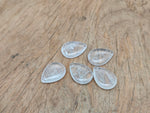 Clear quartz dainty drop crystal pendant from GemstoneGO, perfect for DIY jewelry making, shown hanging with a silver bail.