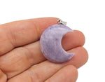 Lepidolite moon pendant featuring a crescent moon shape from GemstoneGO, showcasing its purple gemstone with natural textures.