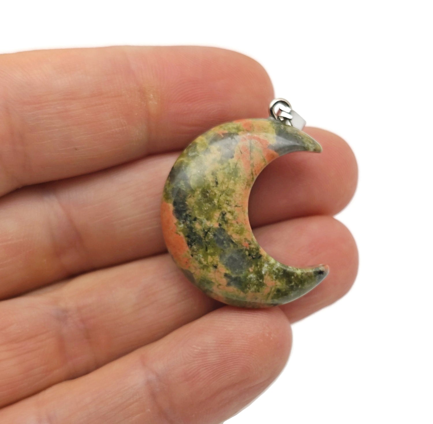 Unakite moon gemstone pendant featuring a crescent moon design by GemstoneGO, showcasing vibrant green and pink hues.