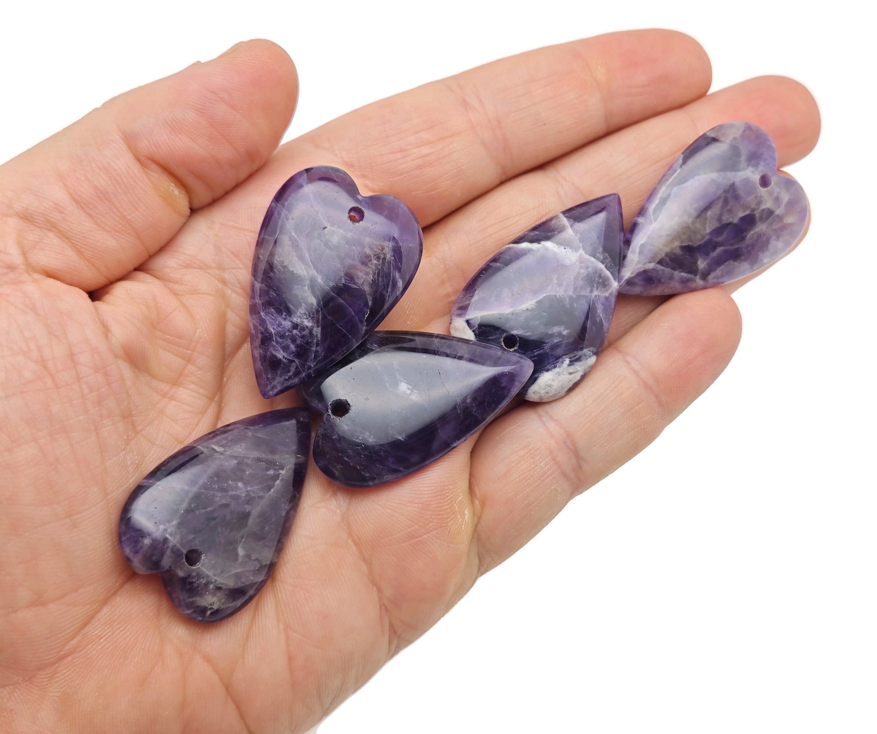 Amethyst long heart-shaped love crystal pendant with healing gemstone, showcasing a purple gemstone on a silver chain.