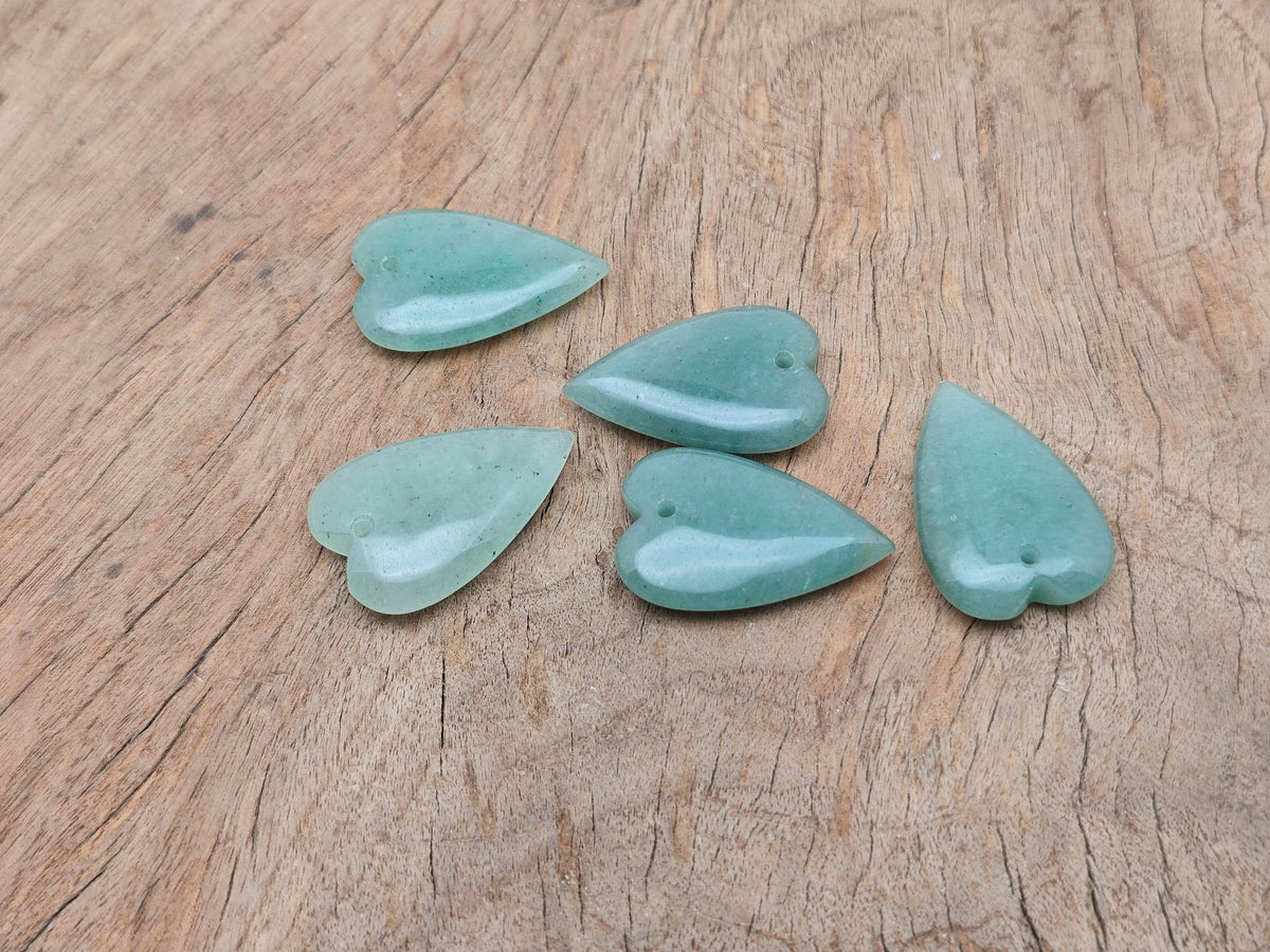 Aventurine long heart-shaped love crystal pendant from GemstoneGO, featuring a large, sharp gemstone heart design.