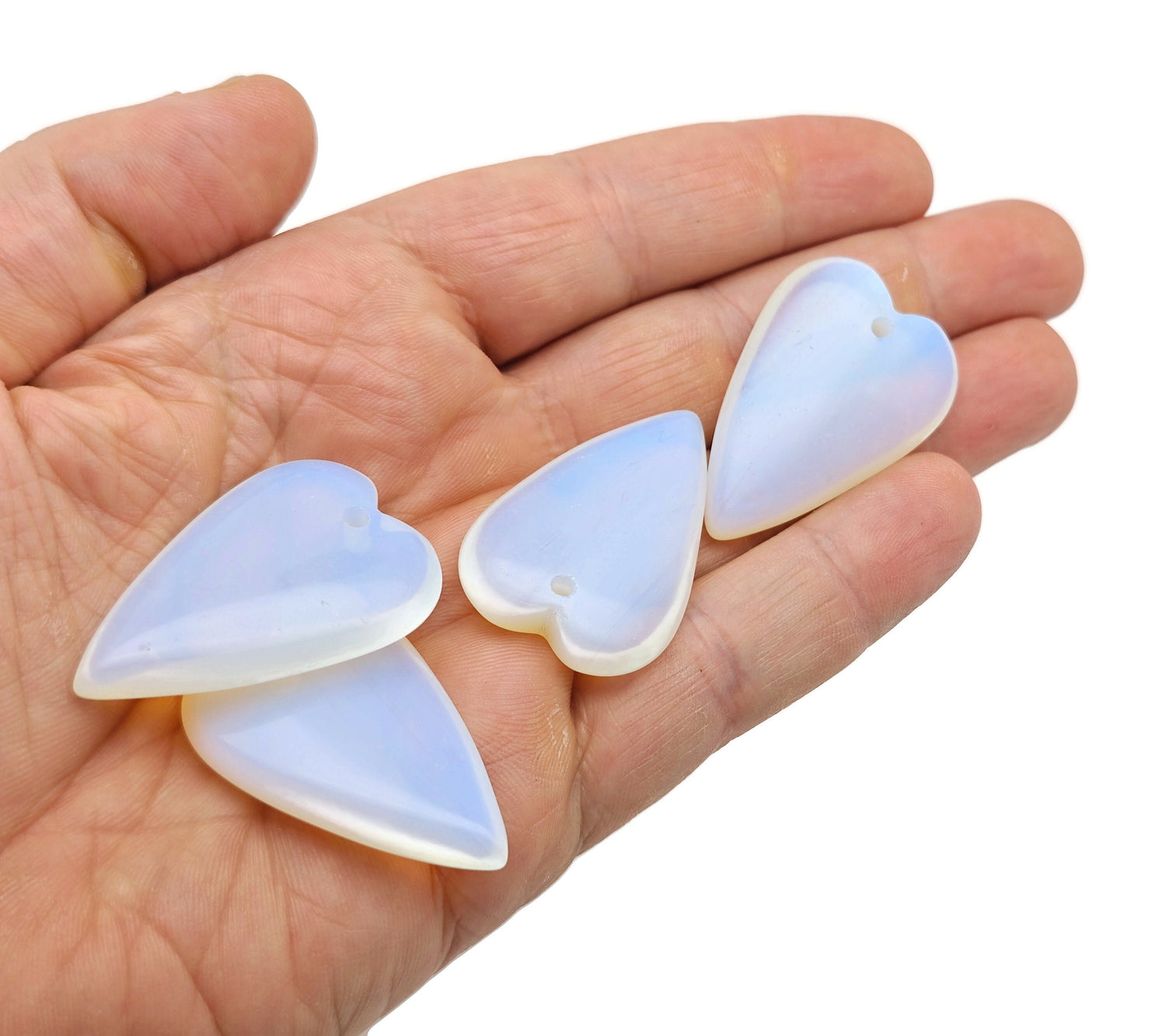 Opalite long heart-shaped love crystal pendant with healing gemstone, showcasing a smooth, translucent heart design.
